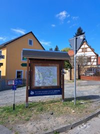 Arbeitseinsatz Reparatur Dachabdeckung Infotafel Ecke Badstraße